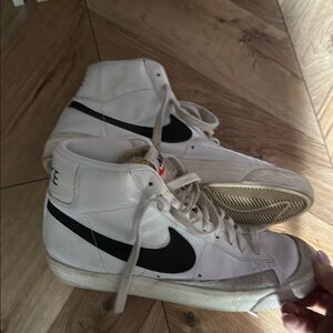 Nike Women’s White and Black High-Top Sneakers
